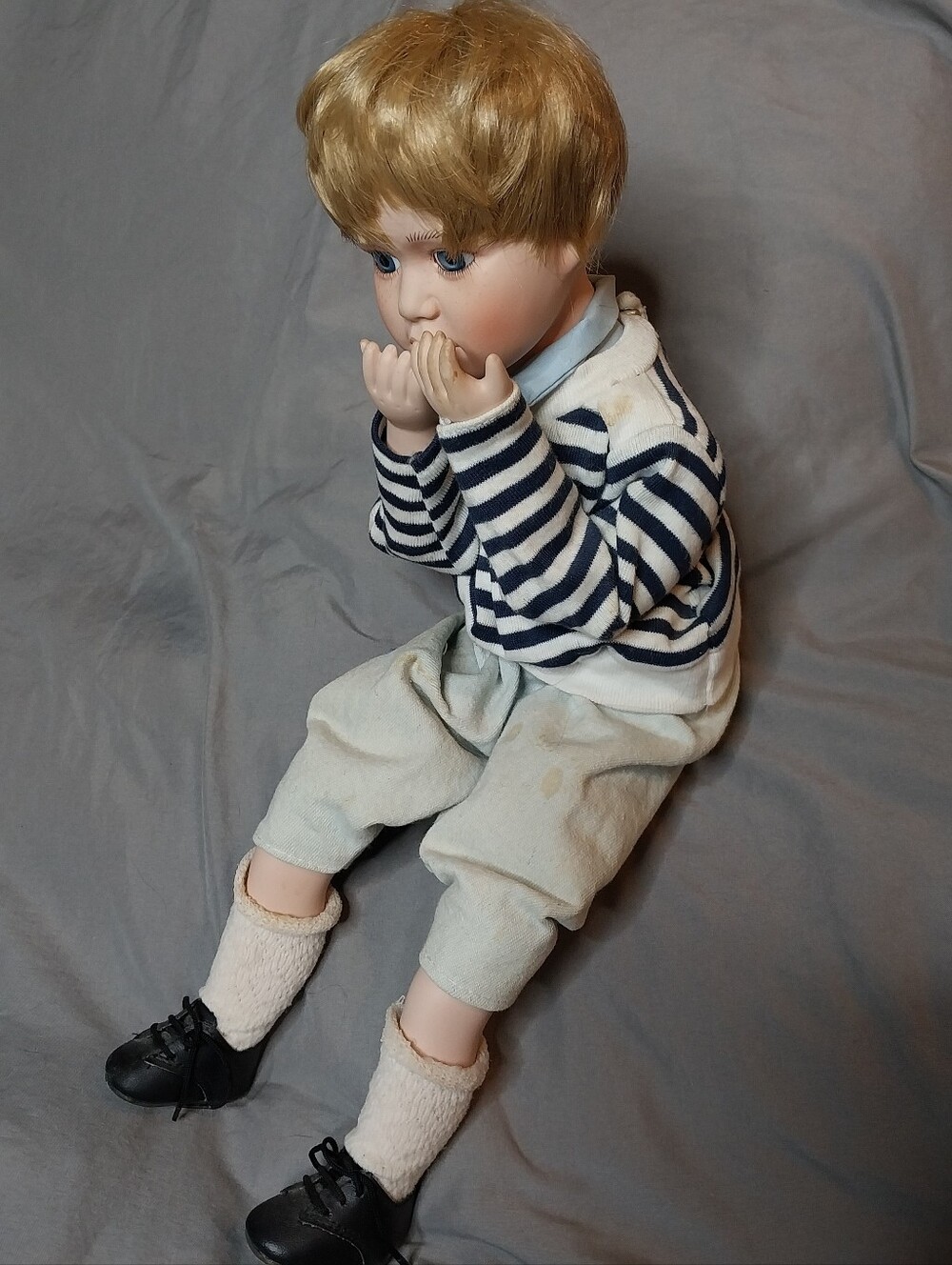 Numbered Collectors Sitting Boy Porcelian Doll in Navy and Cream Outfit